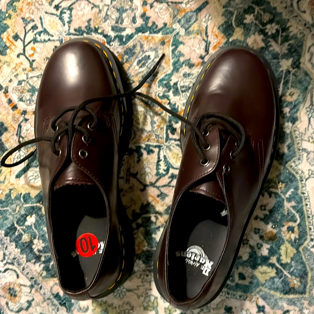 NWOT Brand new never would maroon Doc Marten’s shoes. Size 10.